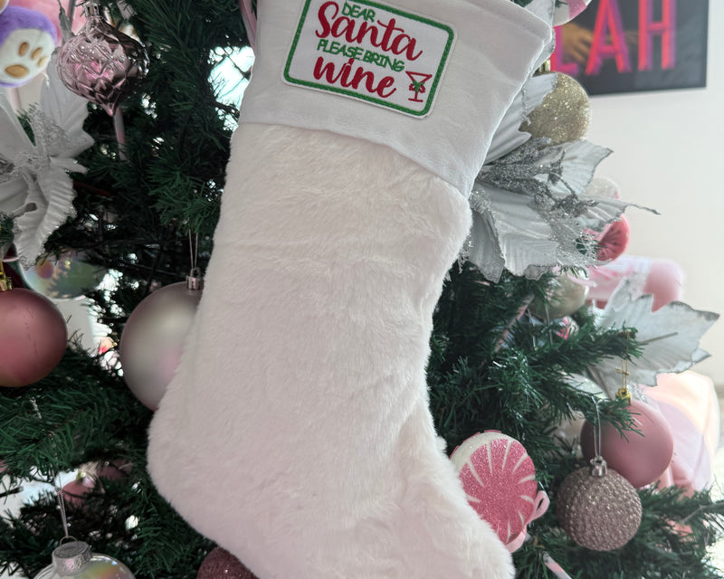 White fur Stocking “ Santa please bring wine “